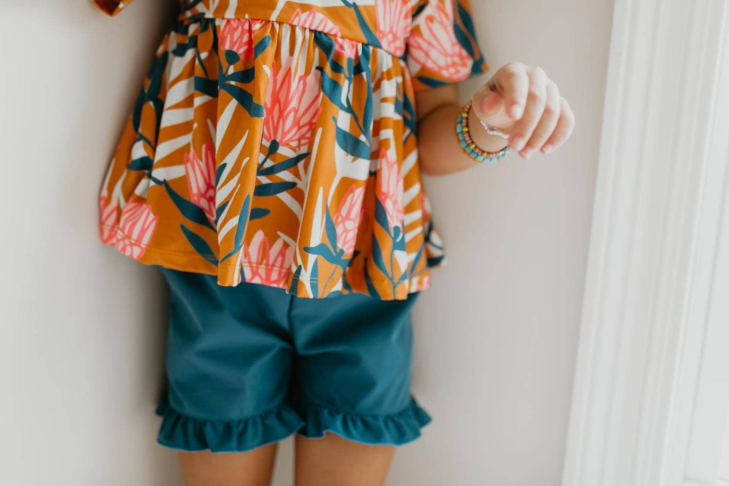 Kids Teal & Tangerine Floral Ruffle Spring Pocket Short Set: 3/4